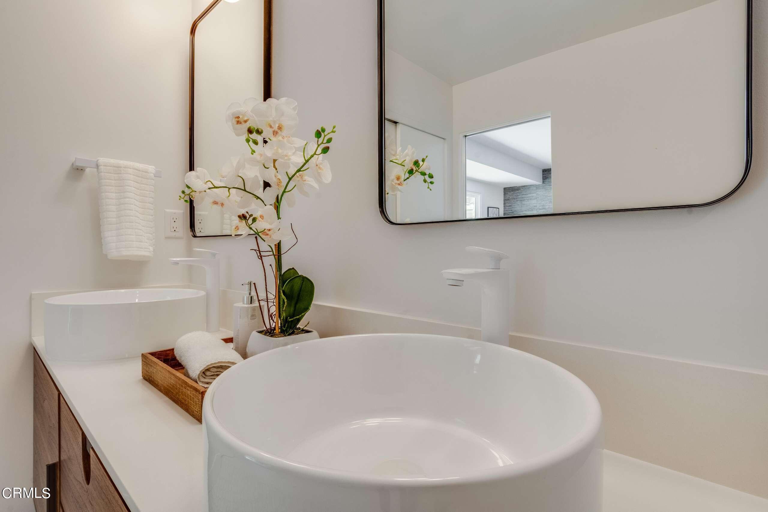 215 Highlawn Place Altadena, CA 91001 - Photo 32 of 38 a white bath tub sitting next to a white sink