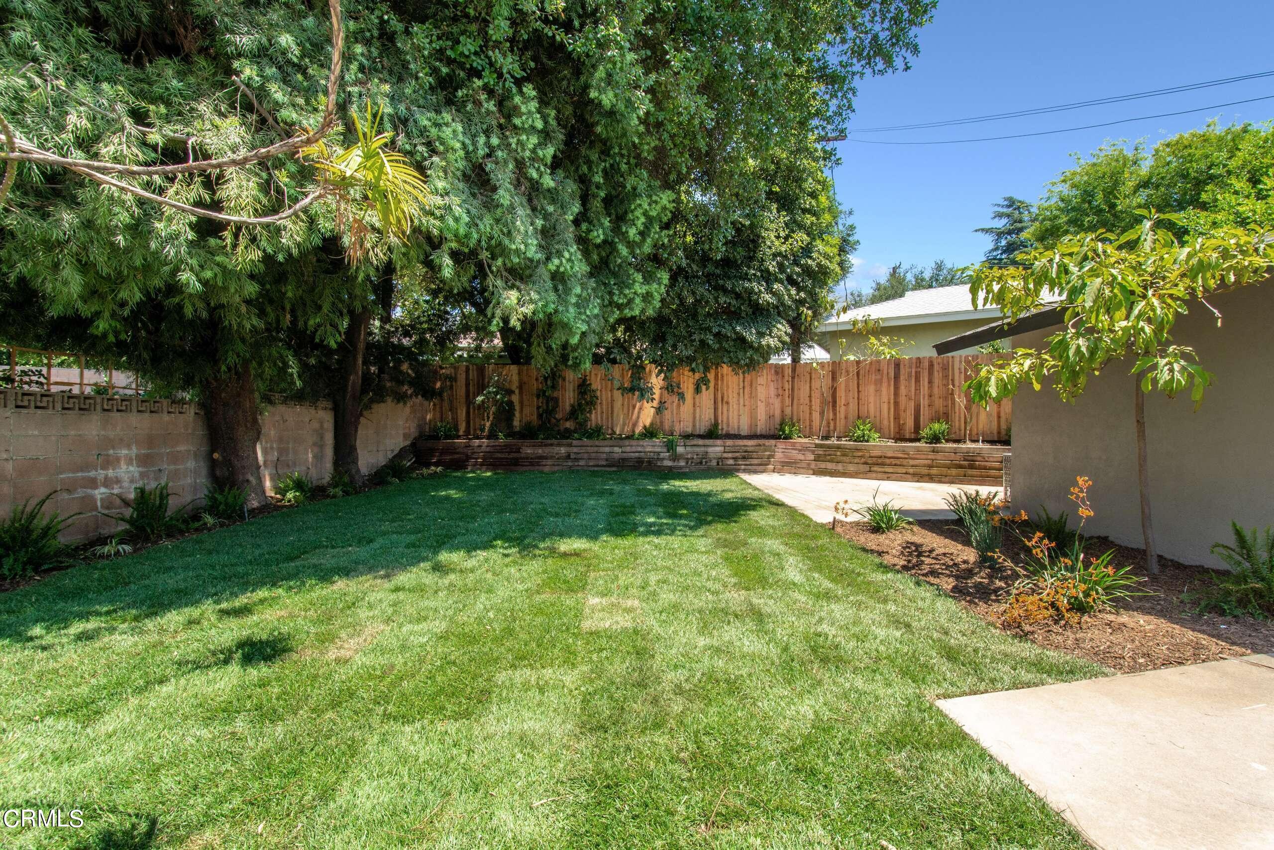 215 Highlawn Place Altadena, CA 91001 - Photo 35 of 38 a view of a yard with a tree