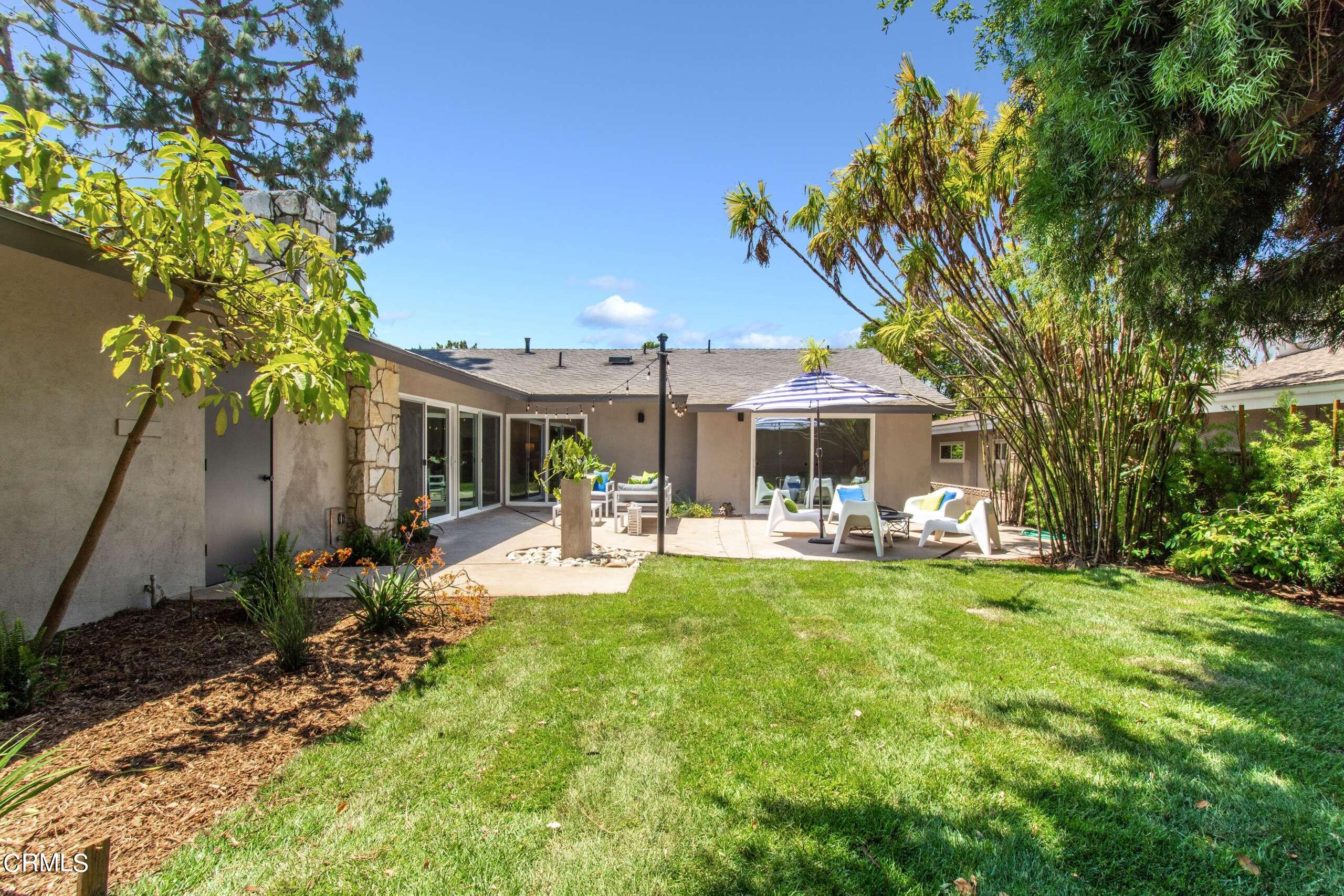 215 Highlawn Place Altadena, CA 91001 - Photo 36 of 38 a front view of a house with swimming pool having outdoor seating