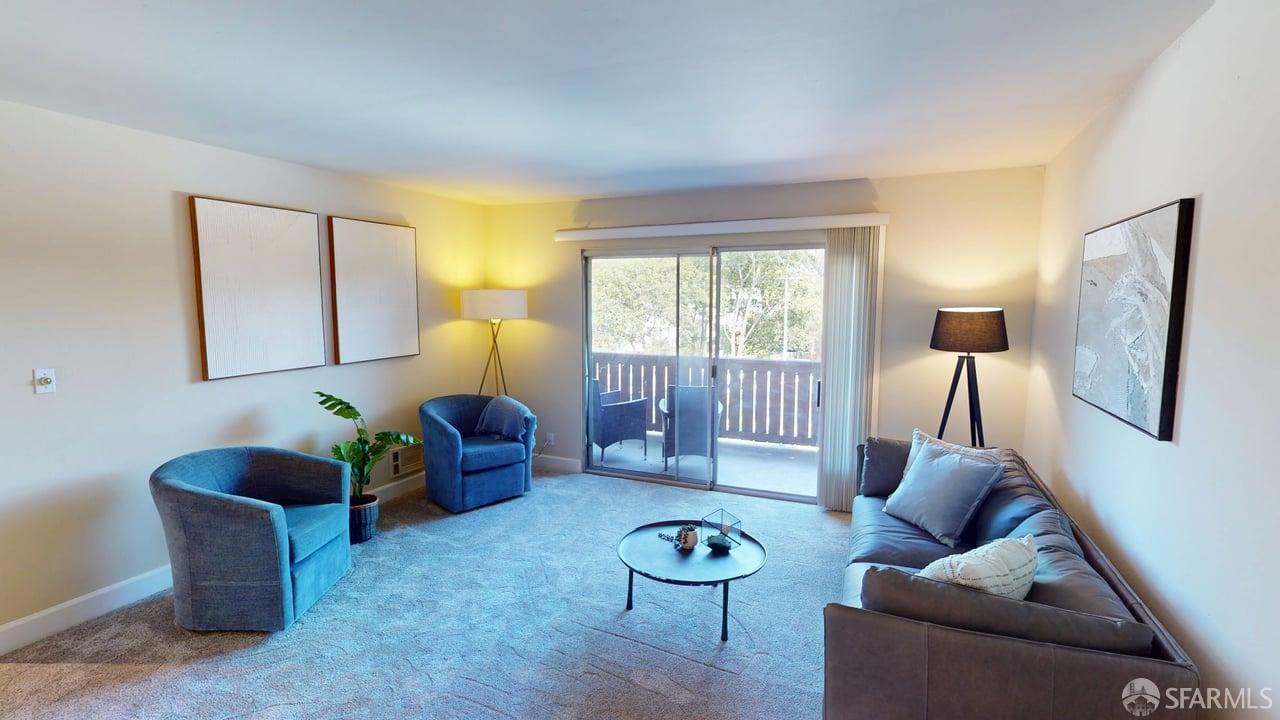 1305 Webster Street, Unit C309 Alameda, CA 94501 - Photo 1 of 24 a living room with furniture and a window