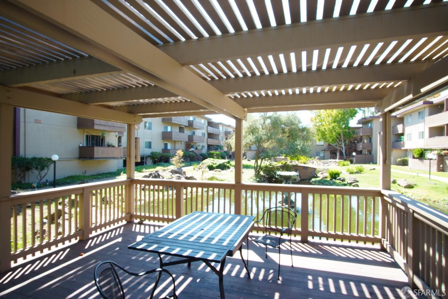 1305 Webster Street, Unit C309 Alameda, CA 94501 - Photo 14 of 24 a view of a porch with wooden floor