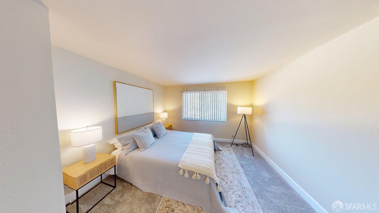 1305 Webster Street, Unit C309 Alameda, CA 94501 - Photo 7 of 24 a bedroom with a bed and a window