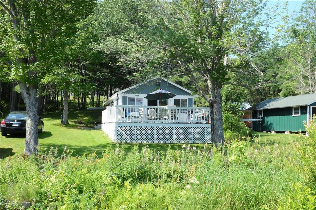 356 Stickney Hill Road Liberty, ME 04949 - Photo 3 of 26 Front deck and side yard