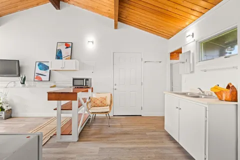 a view of kitchen and sink