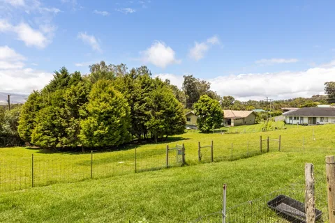 a view of a yard with an outdoor space