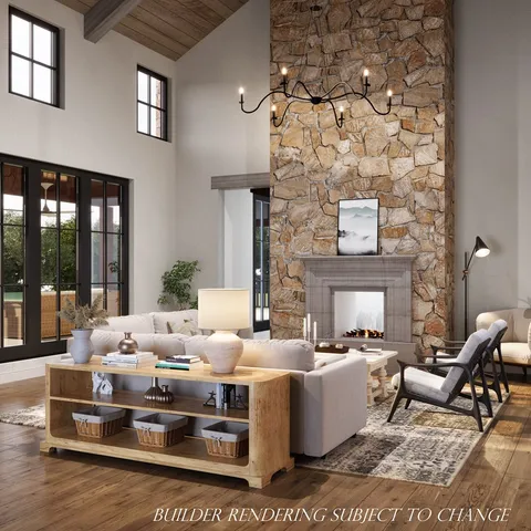 a living room with furniture and fireplace