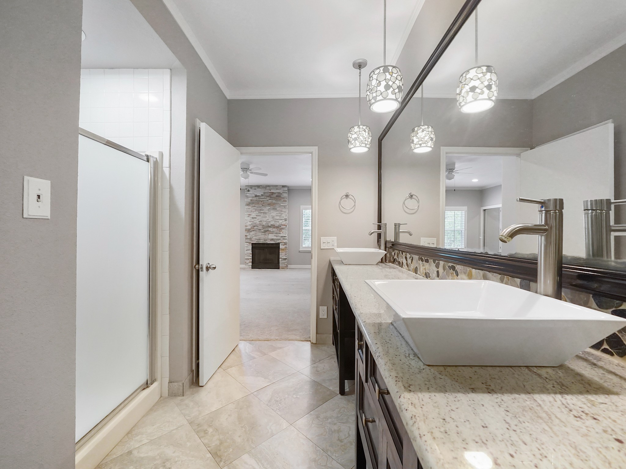 6000 Reims Road, Unit 2205 Houston, TX 77036 - Photo 20 of 35 Expansive primary bathroom with elegant finishes.