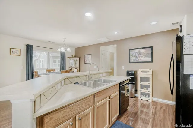 a spacious bathroom with a sink and a large mirror