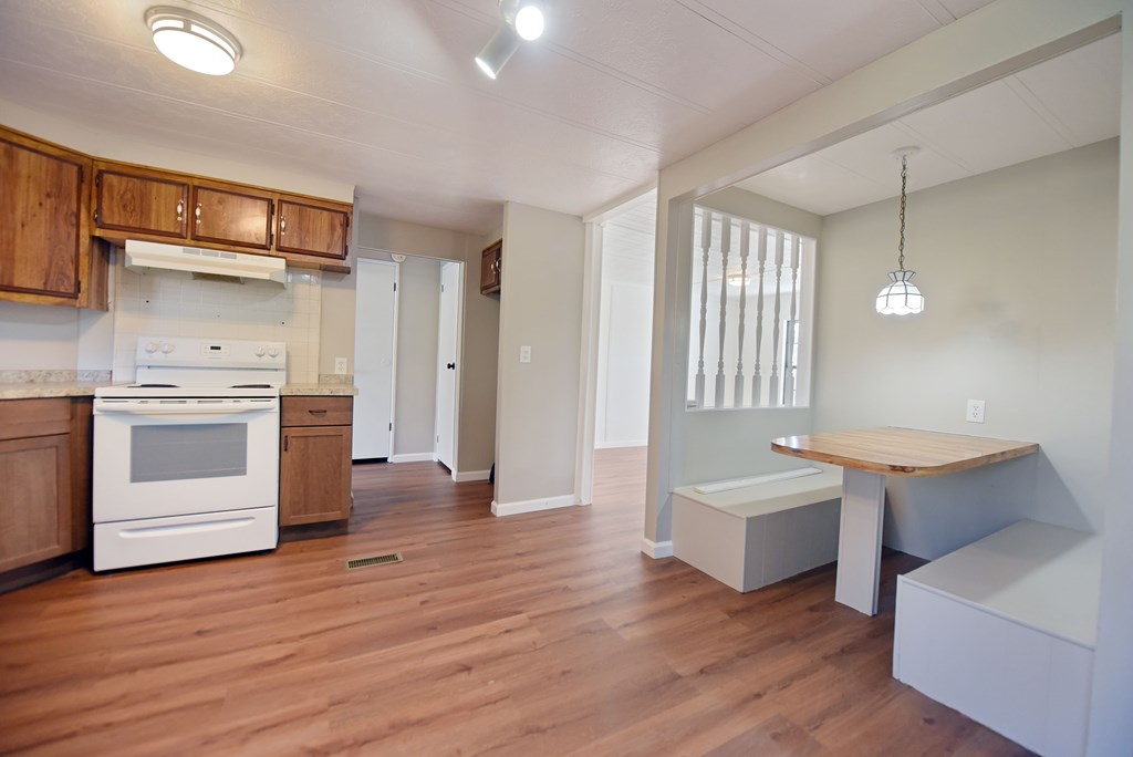 253 Windy Lane Hiawassee, GA 30546 - Photo 37 of 65 a view of kitchen with wooden floor and electronic appliances