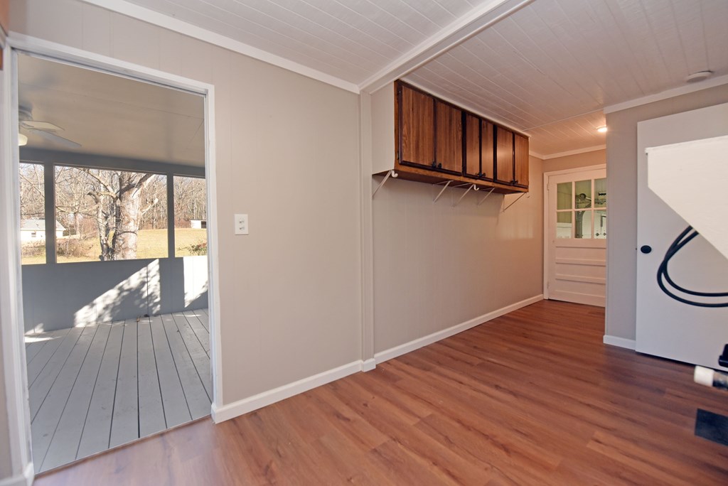 253 Windy Lane Hiawassee, GA 30546 - Photo 40 of 65 a view of a hallway with wooden floor and staircase