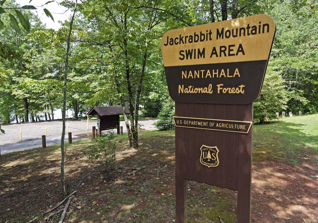 253 Windy Lane Hiawassee, GA 30546 - Photo 48 of 65 a sign board with a tree park