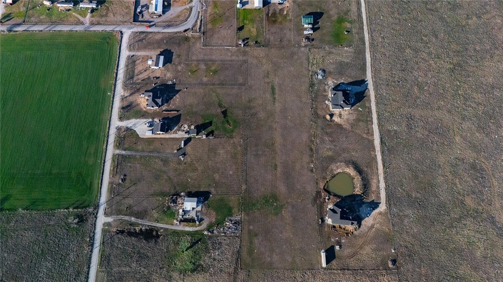 794 West Lone Oak Road Valley View, TX 76272 - Photo 5 of 5 an aerial view of a house with a backyard space