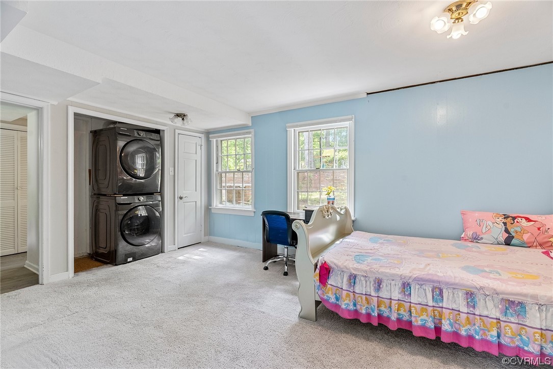 5038 Grassmere Road Richmond, VA 23234 - Photo 11 of 50 a bedroom with a bed dresser and a large window