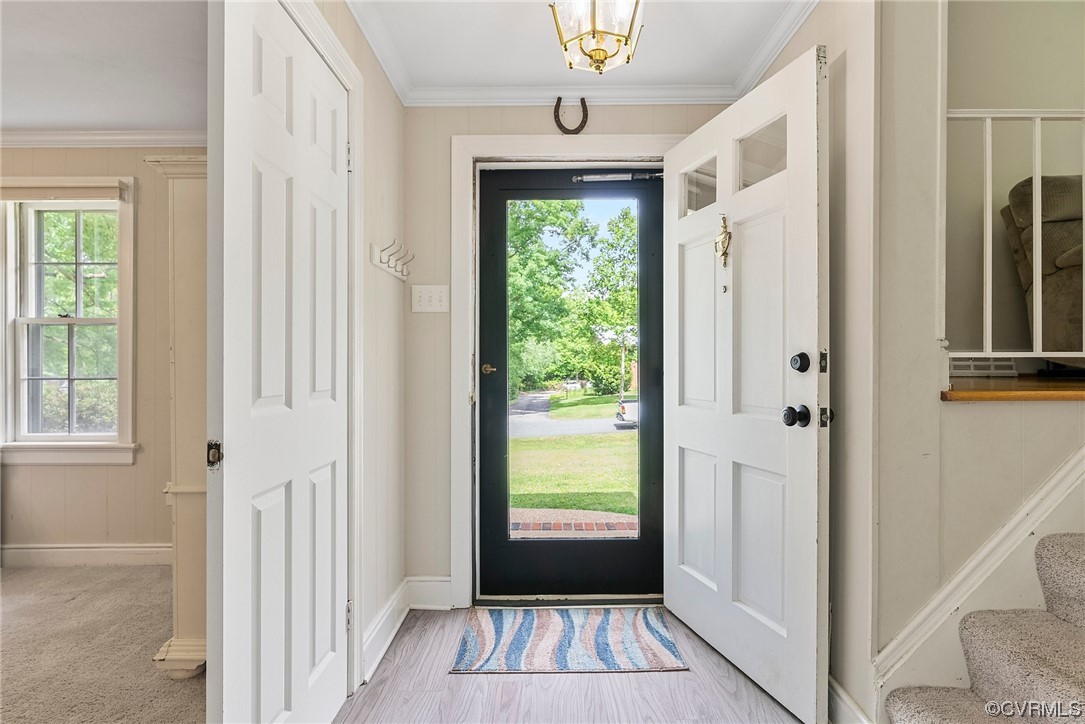 5038 Grassmere Road Richmond, VA 23234 - Photo 15 of 50 a view of a hallway with windows and entryway