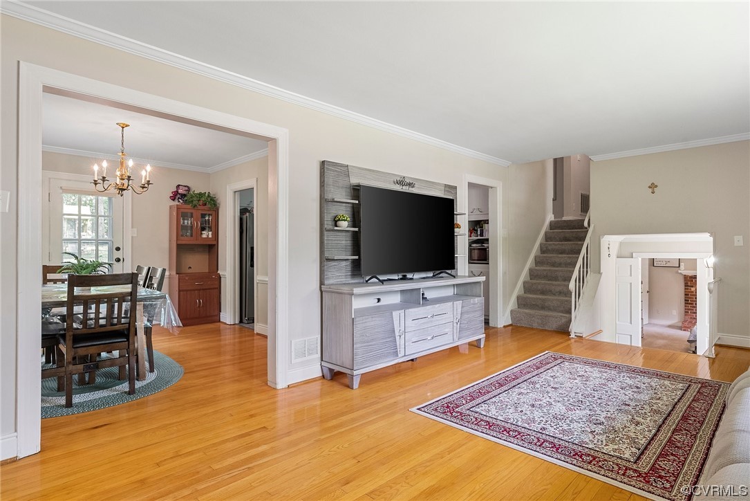 5038 Grassmere Road Richmond, VA 23234 - Photo 20 of 50 a living room with furniture and a flat screen tv