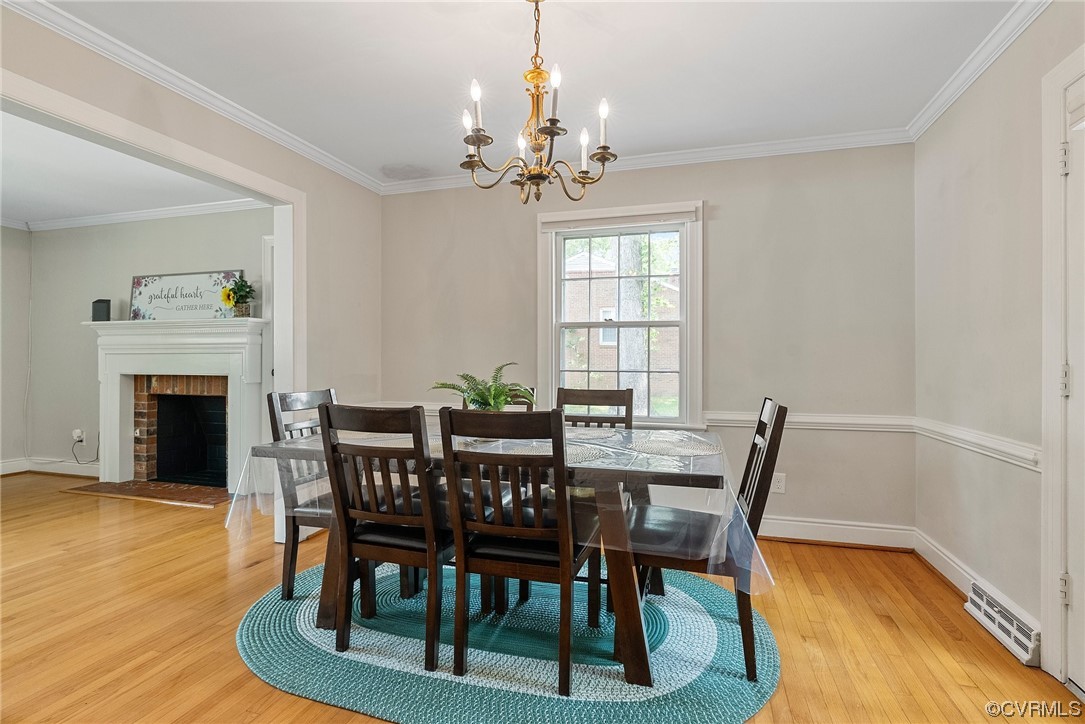 5038 Grassmere Road Richmond, VA 23234 - Photo 23 of 50 a view of a dining room with furniture window and wooden floor