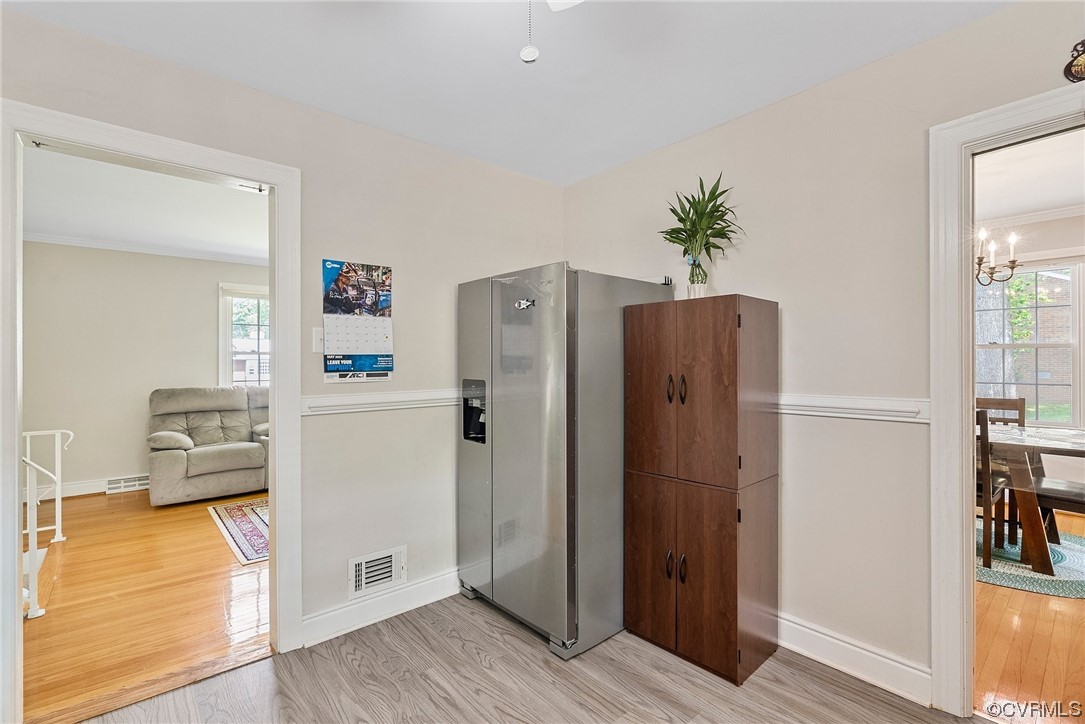 5038 Grassmere Road Richmond, VA 23234 - Photo 27 of 50 a kitchen with a refrigerator and a stove top oven