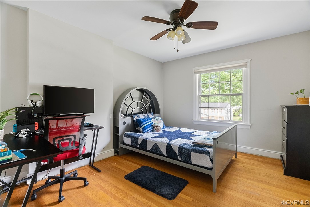 5038 Grassmere Road Richmond, VA 23234 - Photo 32 of 50 a bedroom with furniture and a flat screen tv