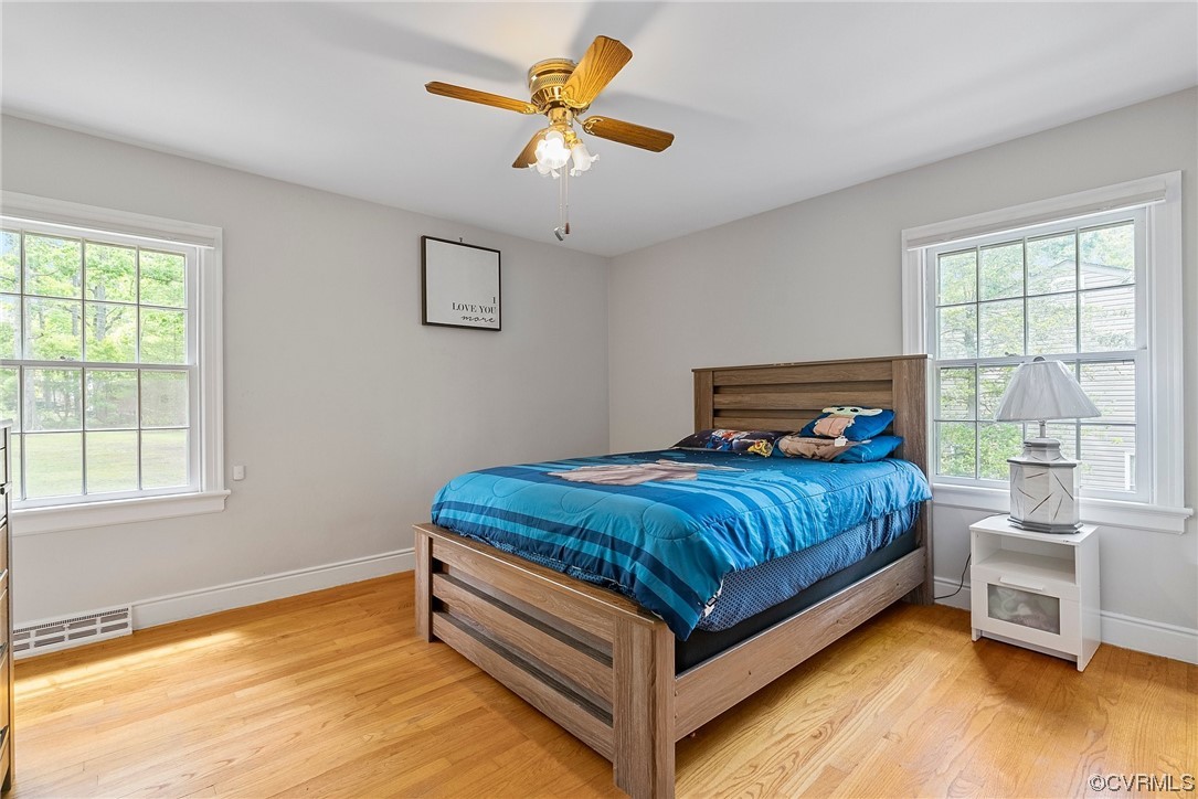 5038 Grassmere Road Richmond, VA 23234 - Photo 34 of 50 a bedroom with a bed and a window