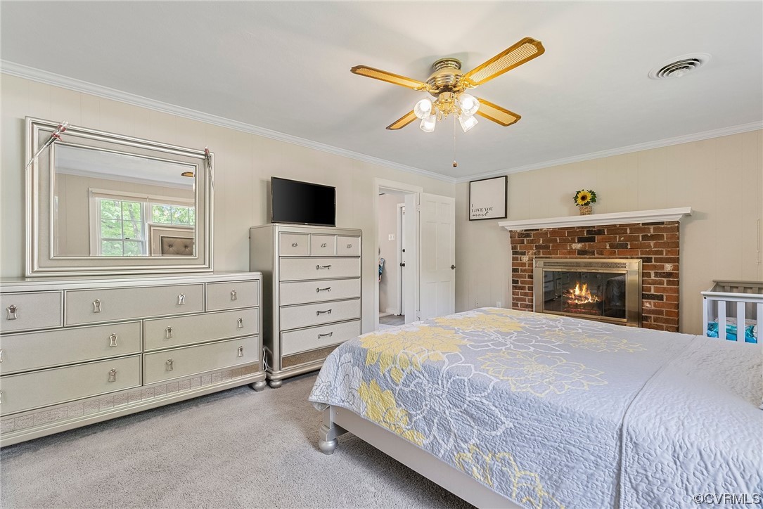 5038 Grassmere Road Richmond, VA 23234 - Photo 8 of 50 a bedroom with a large bed and a tv