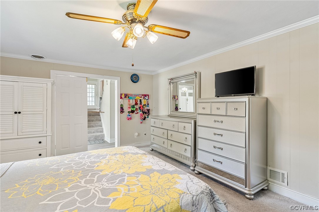 5038 Grassmere Road Richmond, VA 23234 - Photo 9 of 50 a bedroom with a bed and a flat screen tv