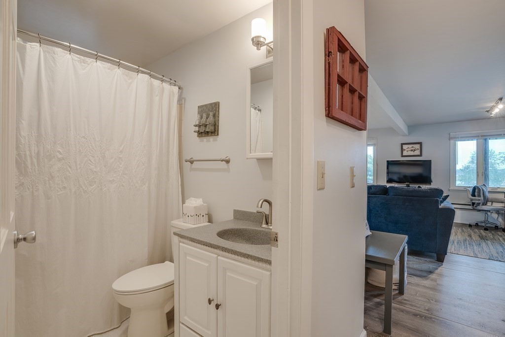 7 Brooks Road Gloucester, MA 01930 - Photo 13 of 33 a bathroom with a sink toilet and shower