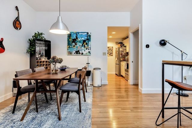 a view of a dining room with furniture