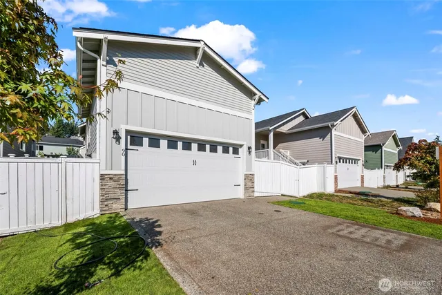 a house with white door of garage