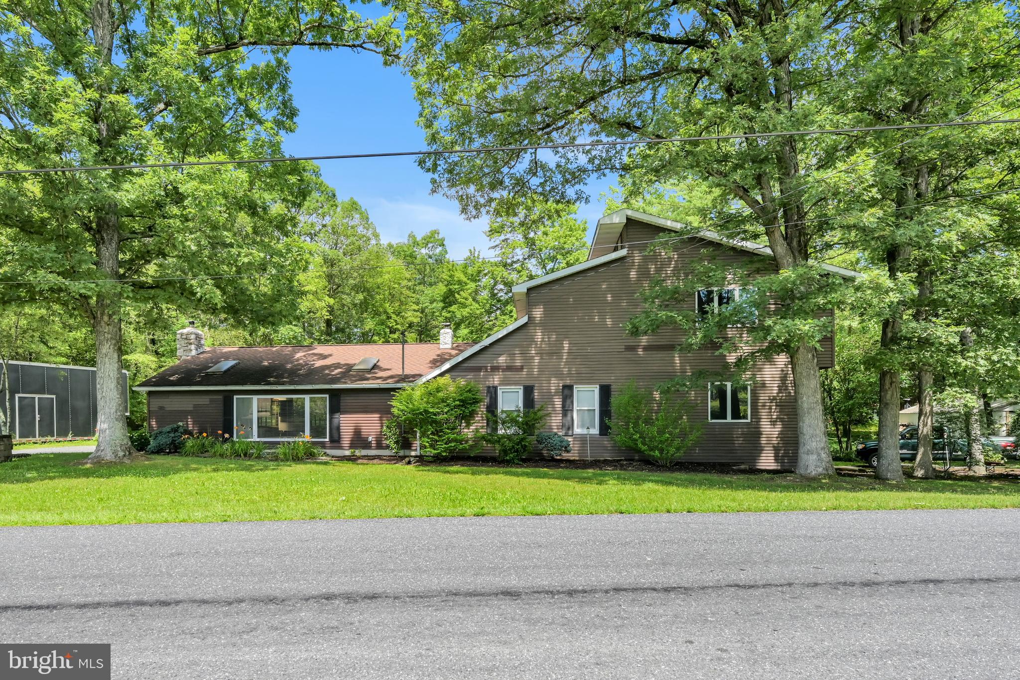 3511 Mountain Road Slatington, PA 18080 - Photo 1 of 27 a front view of house with yard and green space