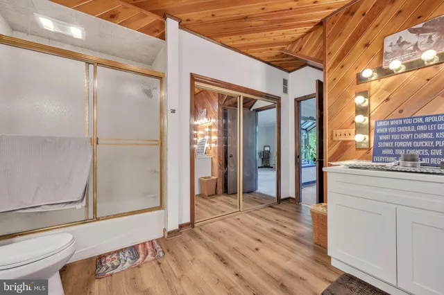 a view of a patio with table and chairs