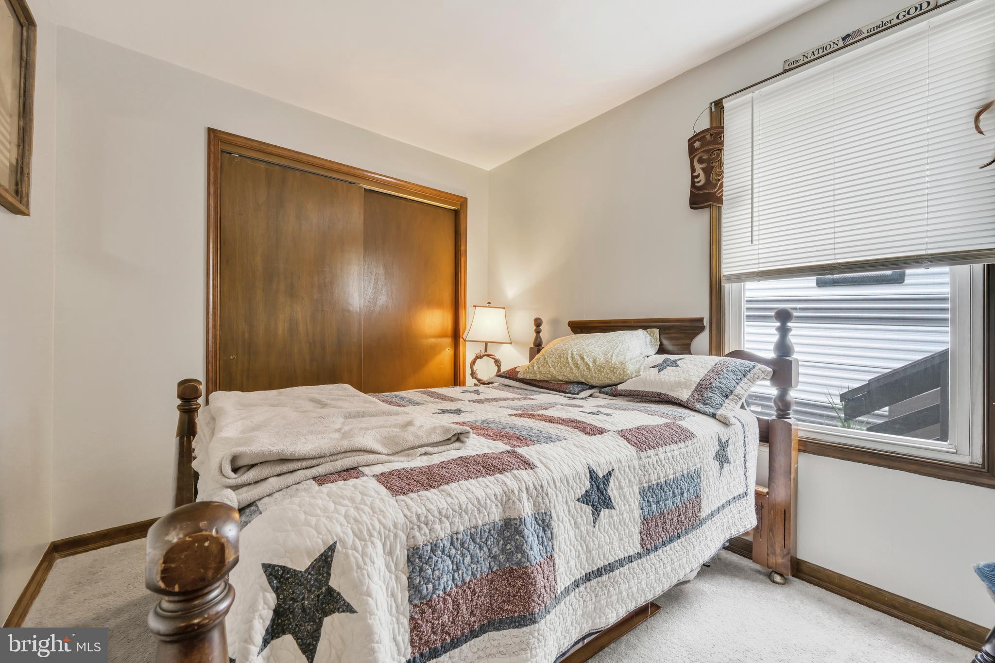 3511 Mountain Road Slatington, PA 18080 - Photo 6 of 27 a bedroom with a bed and a window