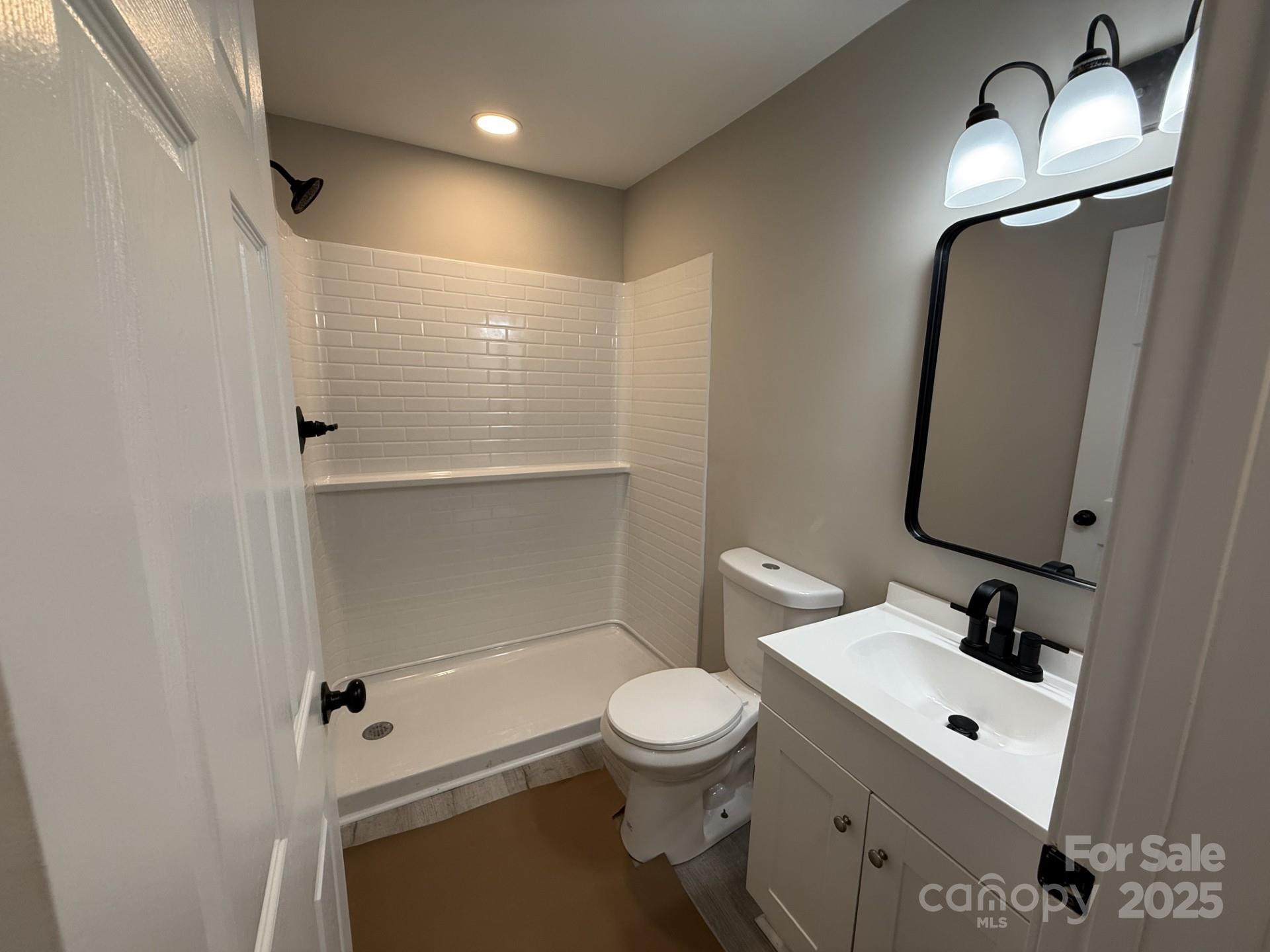 2791 State Rd S-29-285 Lancaster, SC 29720 - Photo 9 of 15 a bathroom with a toilet sink and shower