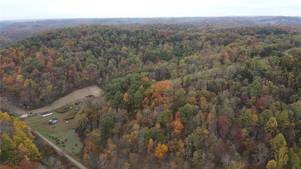 0 Knob Run Road New Freeport, PA 15352 - Photo 3 of 10 a view of a city with lush green forest