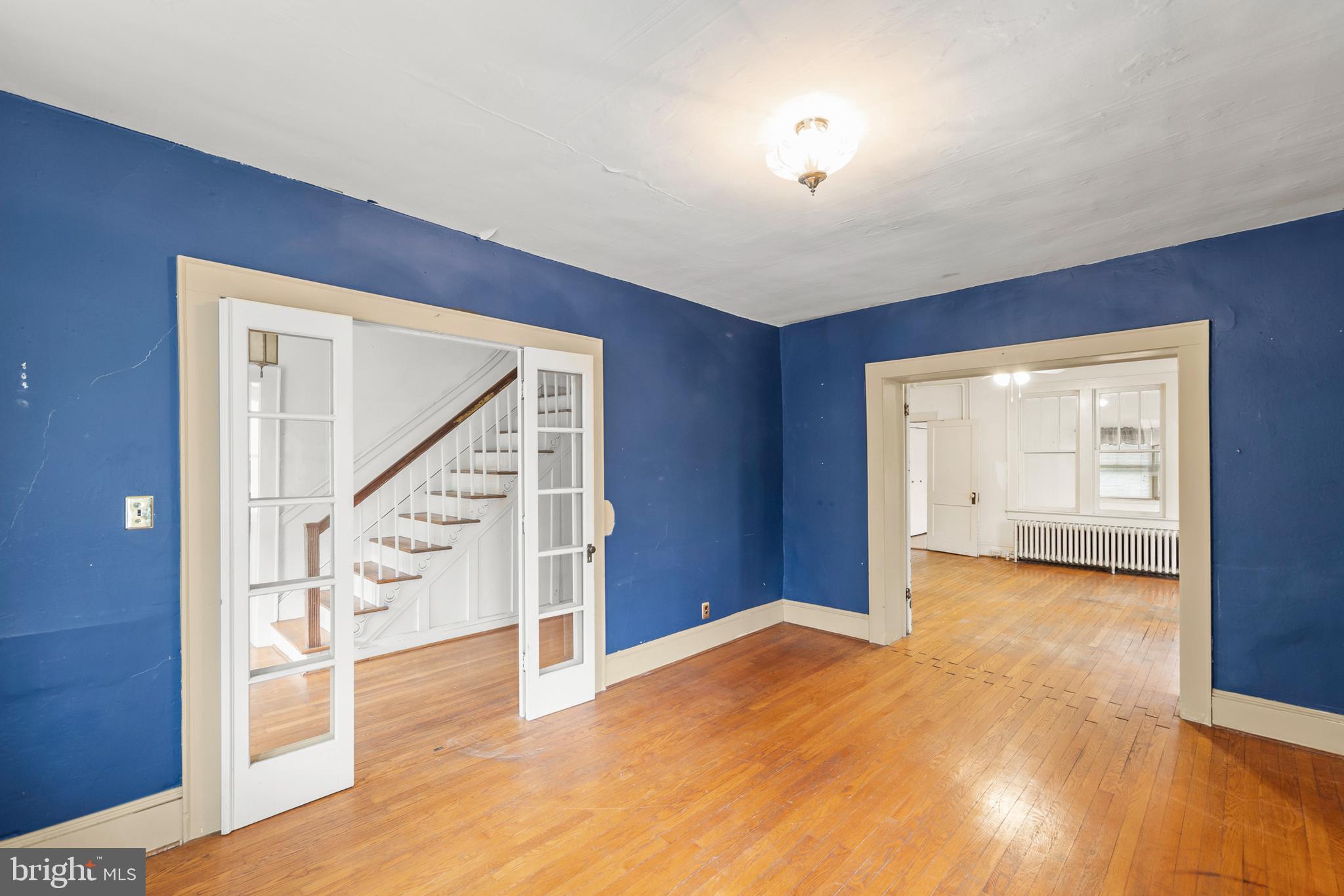 5342 Main Street Stephens City, VA 22655 - Photo 20 of 45 a view of an empty room with wooden floor and stairs