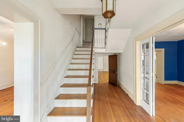 a view of entryway with wooden floor