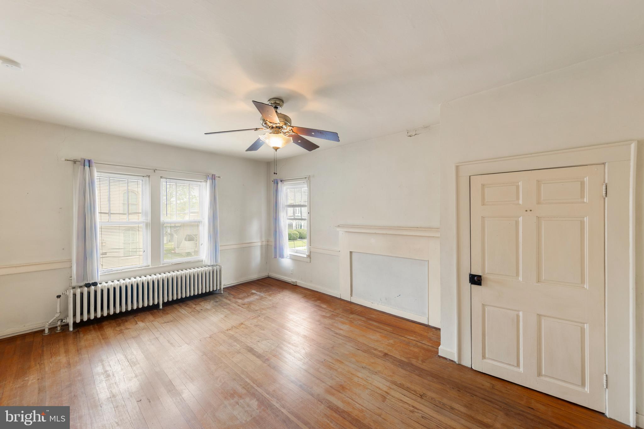 5342 Main Street Stephens City, VA 22655 - Photo 25 of 45 an empty room with wooden floor and windows
