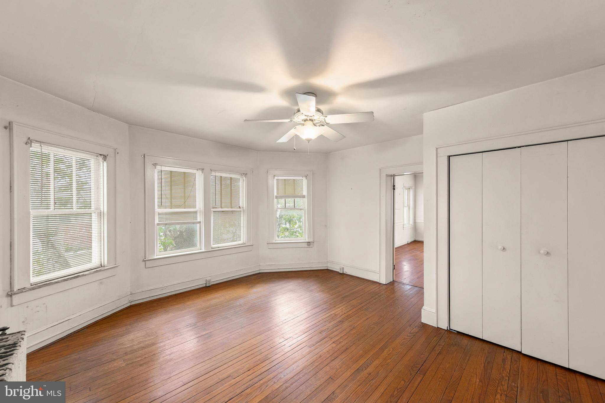 5342 Main Street Stephens City, VA 22655 - Photo 32 of 45 a view of an empty room with wooden floor and a window