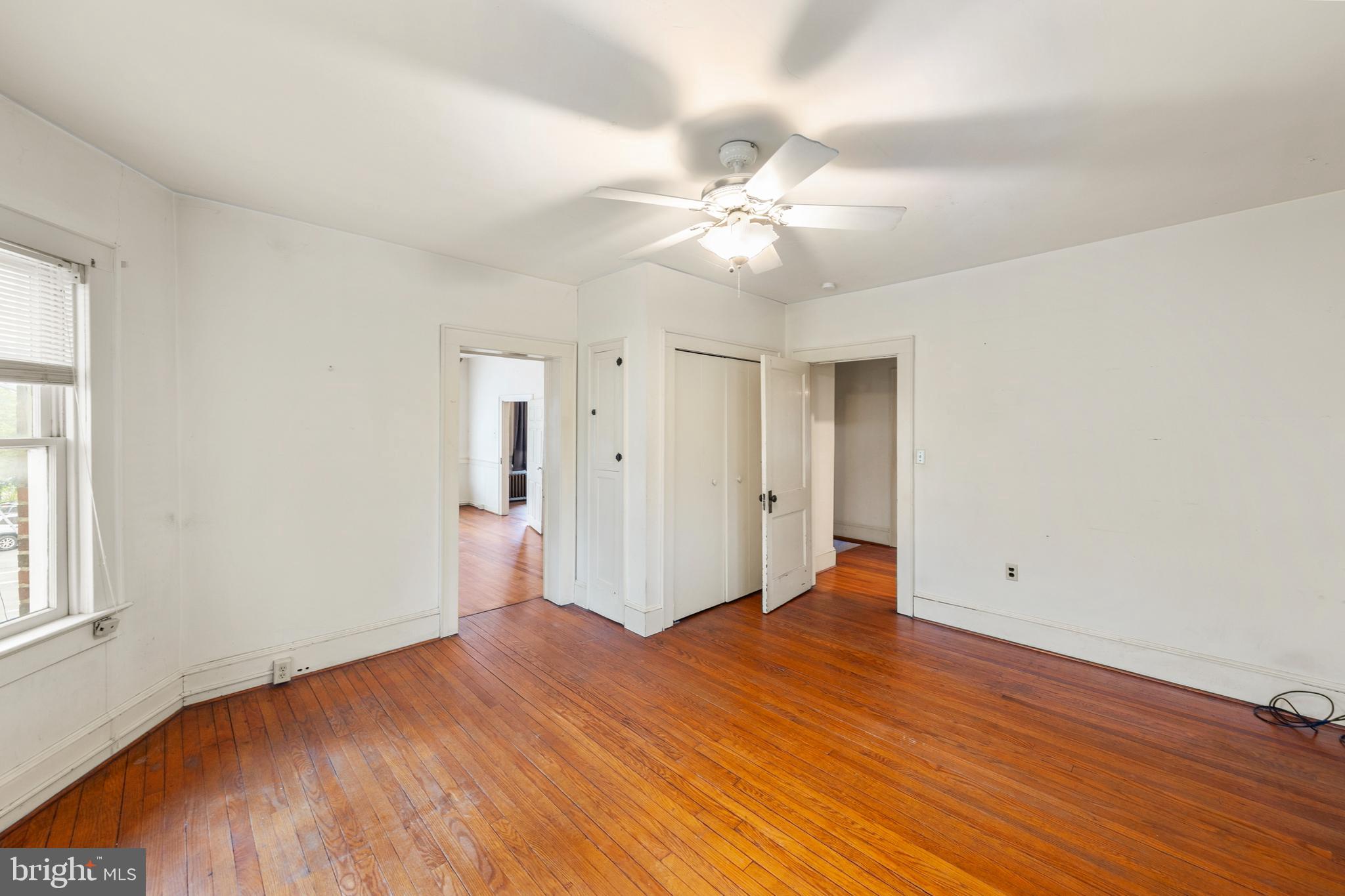 5342 Main Street Stephens City, VA 22655 - Photo 33 of 45 an empty room with wooden floor and windows