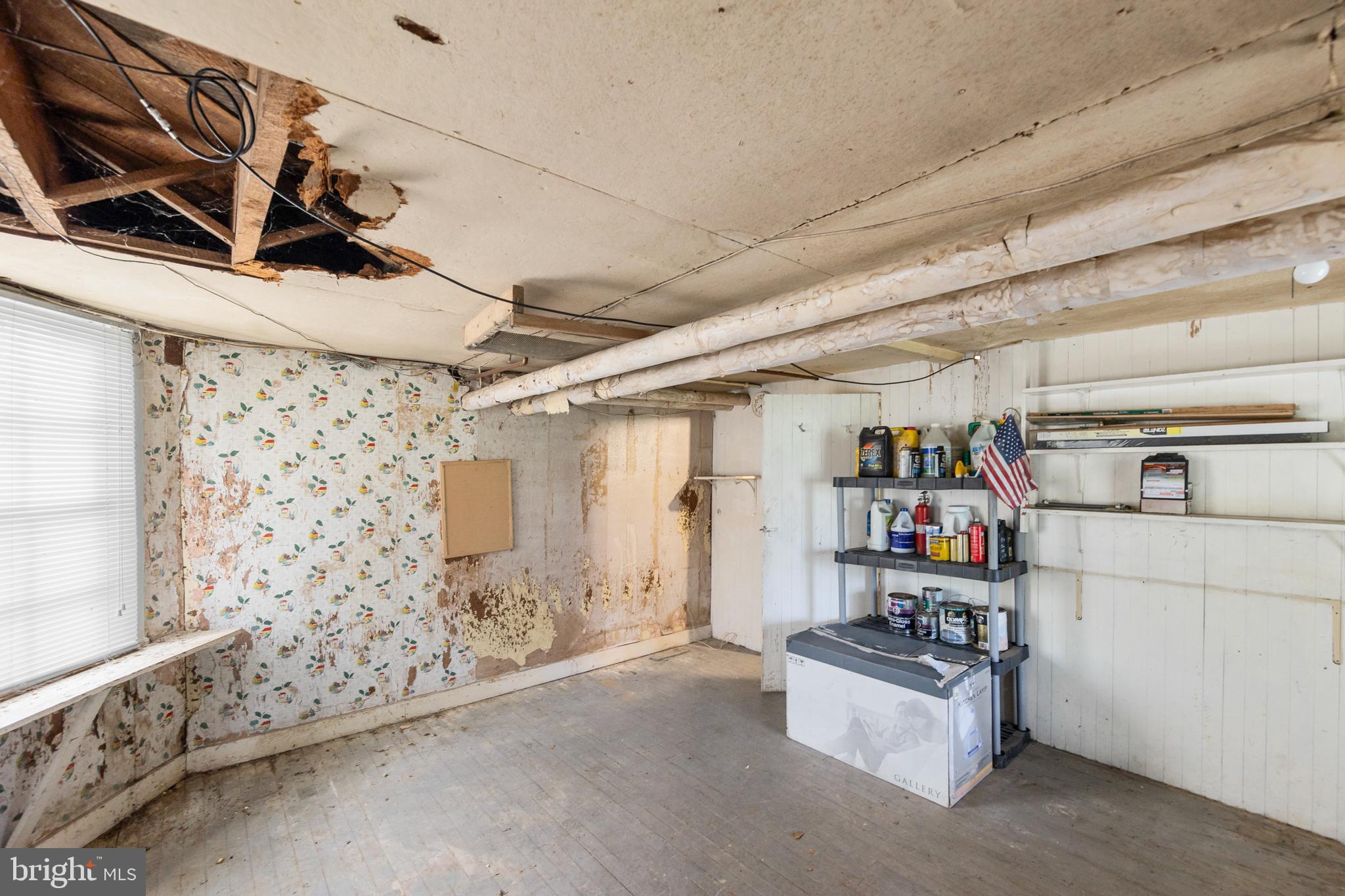 5342 Main Street Stephens City, VA 22655 - Photo 38 of 45 a storage room with washer and dryer