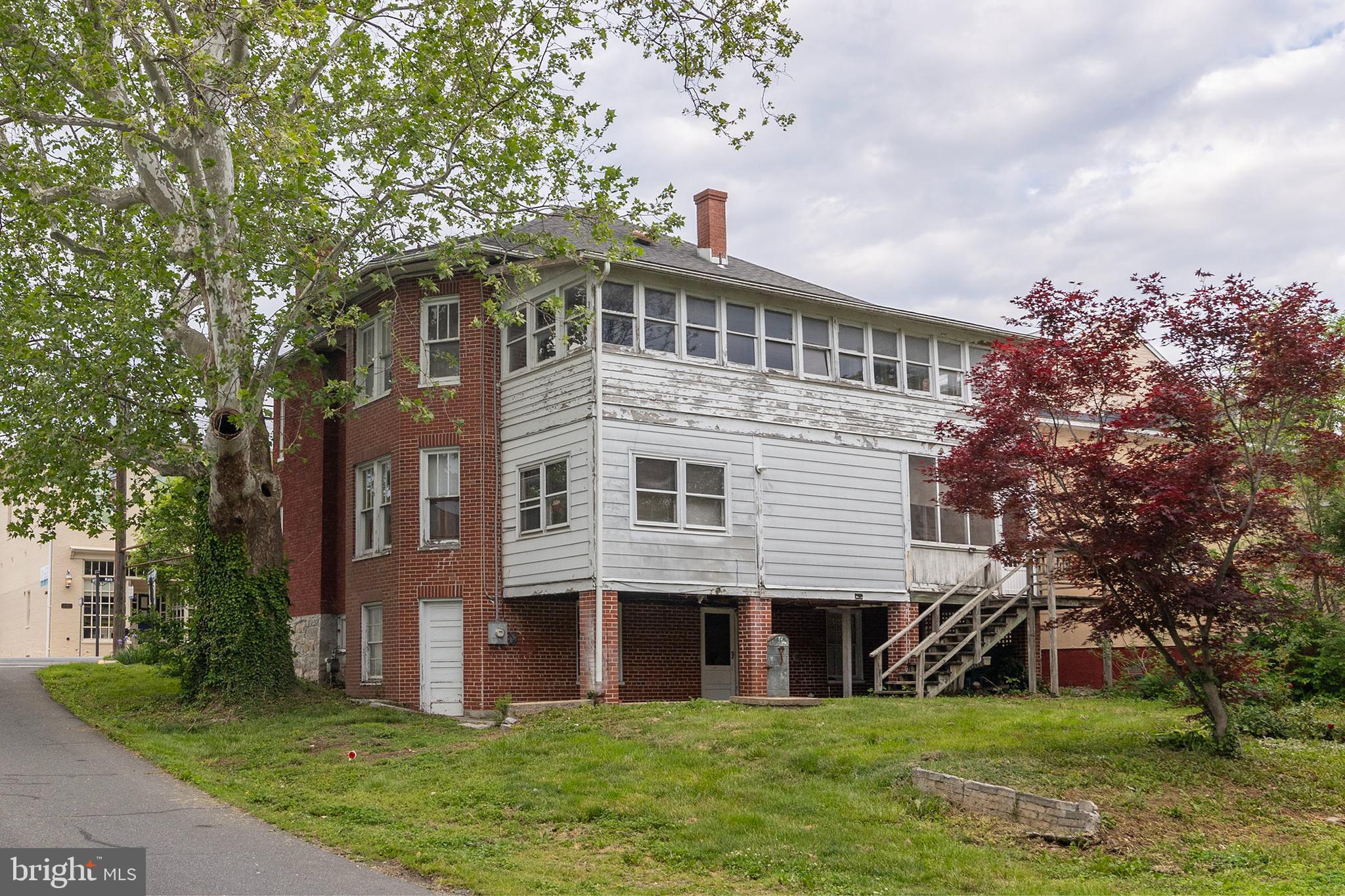5342 Main Street Stephens City, VA 22655 - Photo 43 of 45 a front view of a house with a garden