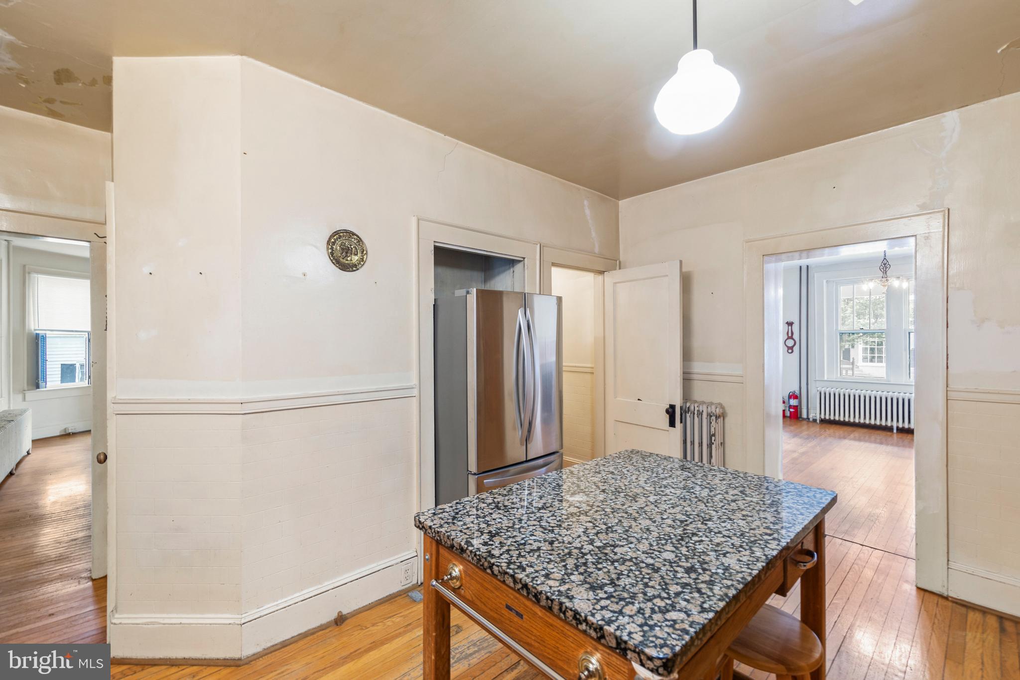 5342 Main Street Stephens City, VA 22655 - Photo 10 of 45 a kitchen with stainless steel appliances granite countertop a refrigerator and a sink