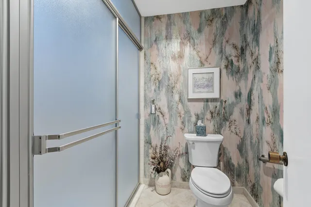 a bedroom with a bed furniture and a window