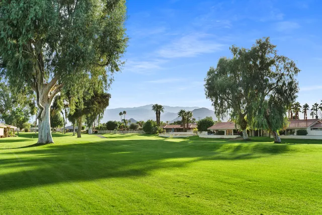 an aerial view of residential house with an outdoor space