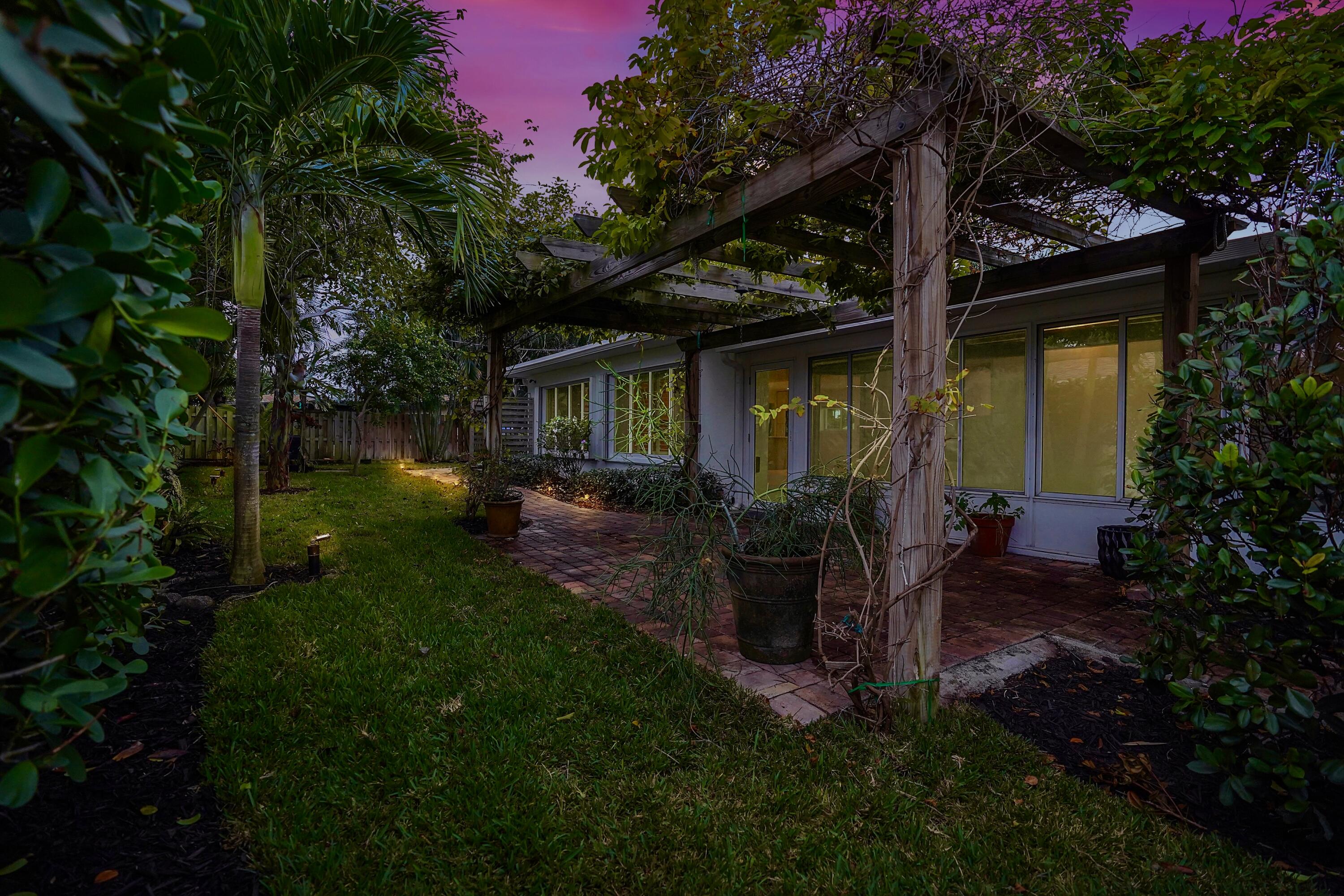 2298 Northeast 3rd Way Boca Raton, FL 33431 - Photo 47 of 55 pergola with elegant vines