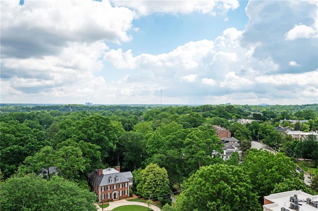 145 15th Street Northeast, Unit 1225 Atlanta, GA 30361 - Photo 21 of 54 a view of a bench in a yard