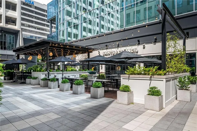 a view of a chairs and table in a patio