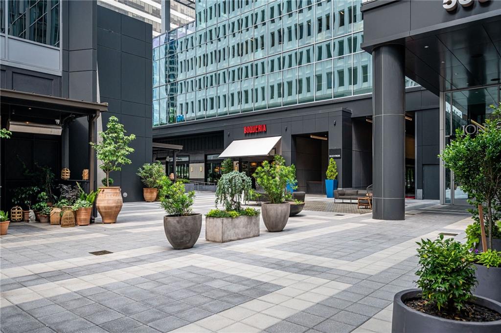 145 15th Street Northeast, Unit 1225 Atlanta, GA 30361 - Photo 26 of 54 a view of a building with sitting area