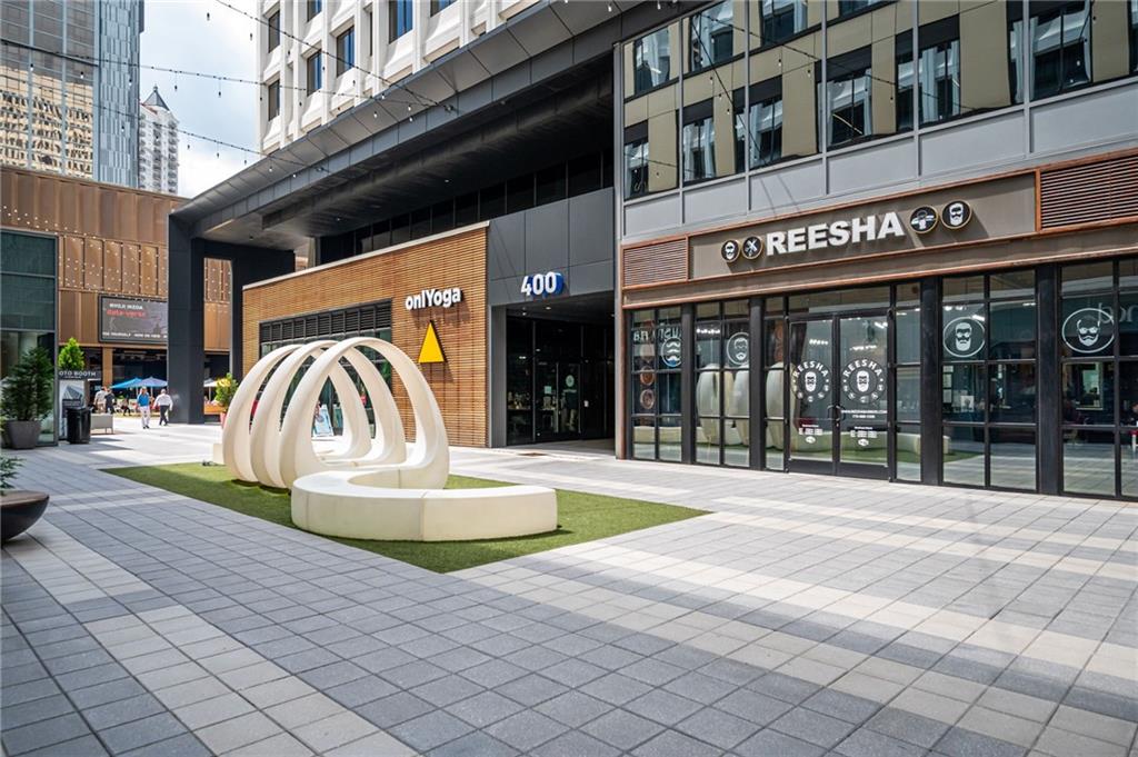 145 15th Street Northeast, Unit 1225 Atlanta, GA 30361 - Photo 27 of 54 a view of a brick building with a outdoor space