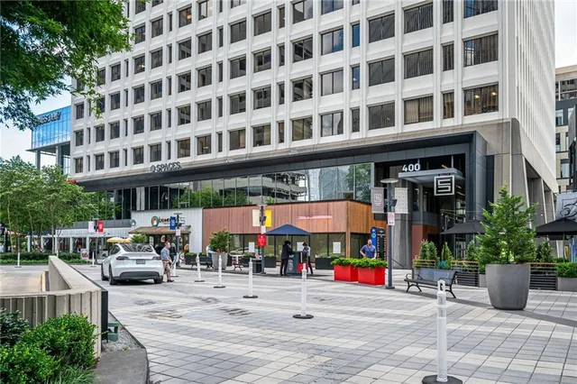 a view of street with sitting area