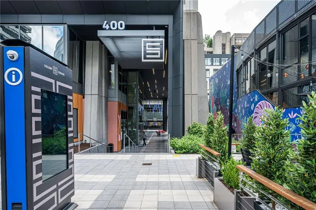 a view of tall building with a outdoor view of a building